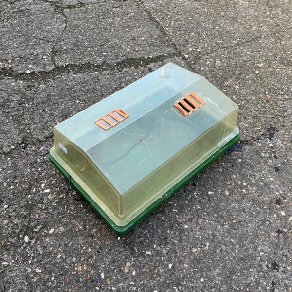 Vintage electric greenhouse propagator for seed starting.