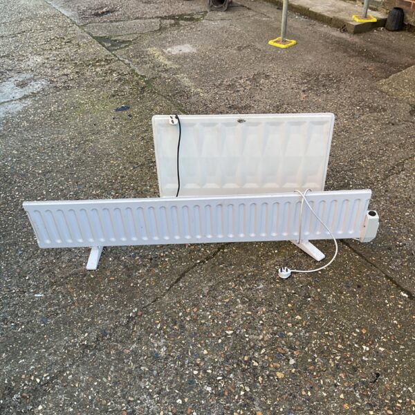 White electric oil radiator for portable home heating.