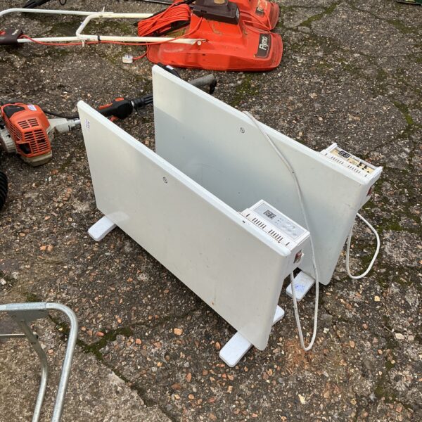White electric panel heater for wall mounting, offered as viewed.