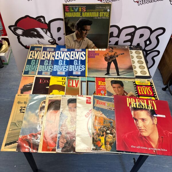 Large bundle of vintage Elvis Presley vinyl records for collectors.