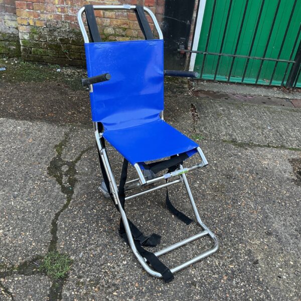 Blue emergency folding wheelchair for quick mobility assistance.