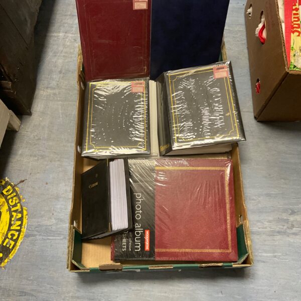 A lot of vintage empty photo albums for scrapbooking and photo storage.