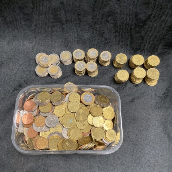 Diverse euro coin collection and foreign currency lot for collectors.