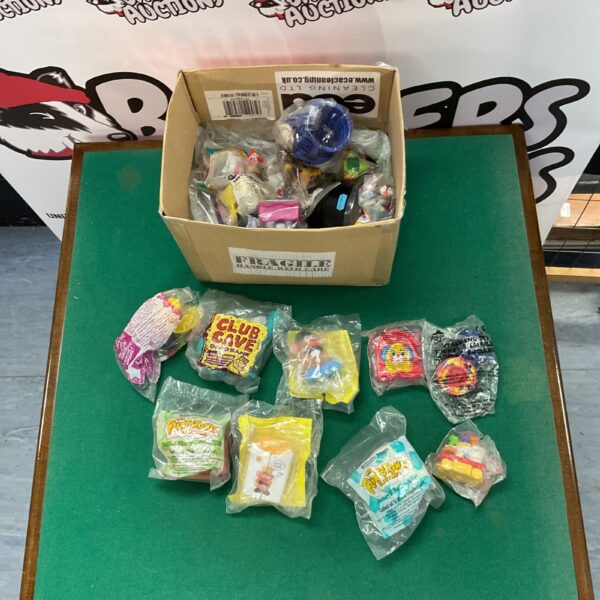 Mixed lot of fast food toys including McDonalds and Disney items.