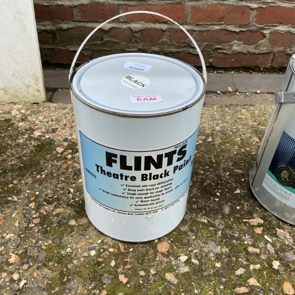 Tin of Flints Black Theatre Paint for stage and scenery.