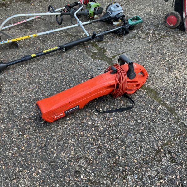 Side view of a Flymo garden vac with a long nozzle.