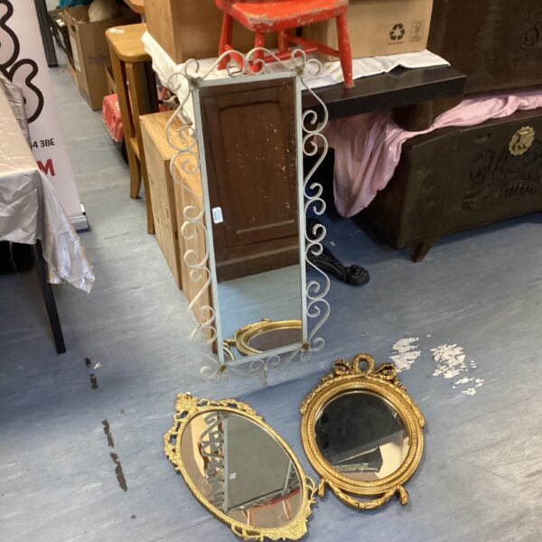 Lot of three French style and wrought iron mirrors for wall decor.