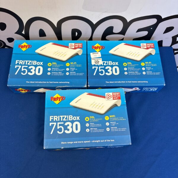 Three Fritz Box 7530 Mesh Wifi systems pictured.