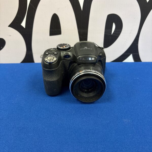 Fujifilm FinePix S2750HD digital camera, black, front view.