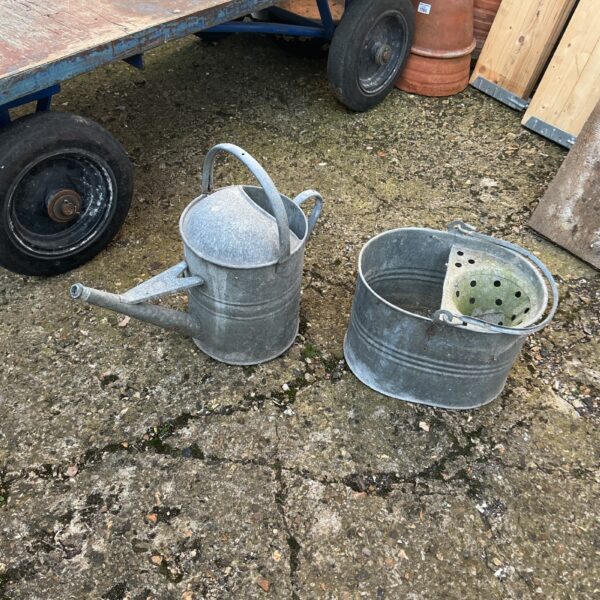 Vintage galvanised bucket and watering can for garden use.