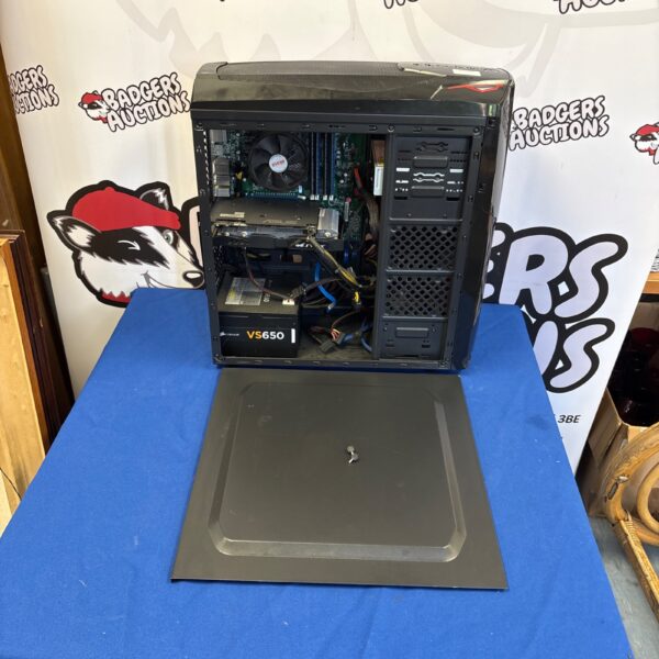Black gaming PC tower with visible internal components.