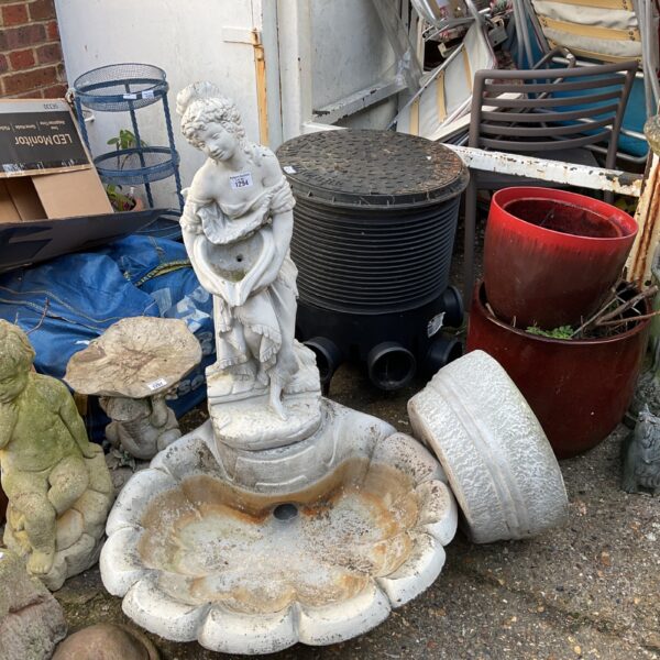 Vintage cast stone garden water feature with maiden sculpture.