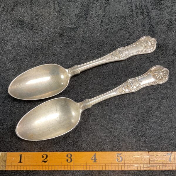 Pair of antique Georgian silver tea spoons, hallmarked sterling silver.