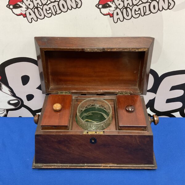 Antique Georgian sarcophagus tea caddy with hinged lid.