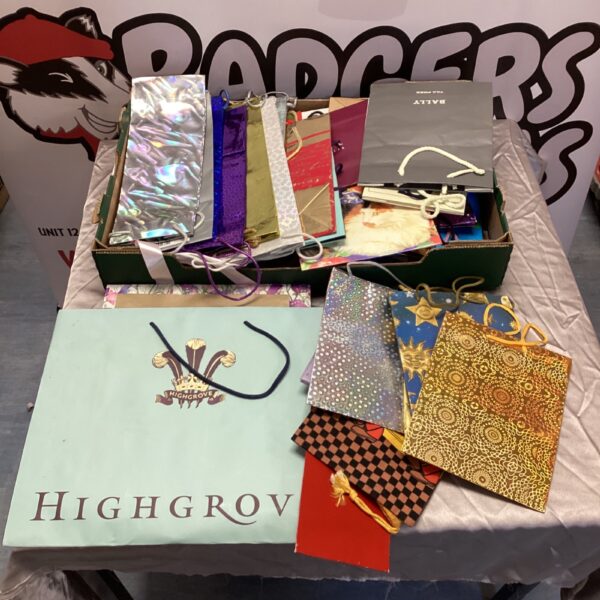 Large lot of assorted gift bags for parties and celebrations.