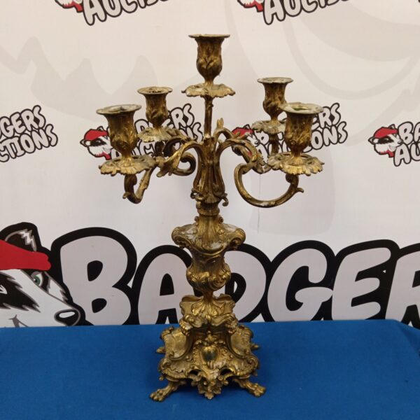Ornate gilt brass Rococo candelabra with multiple arms.