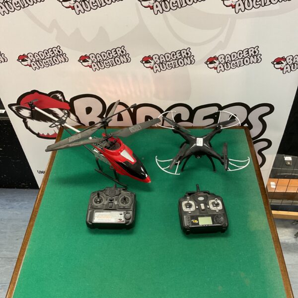 RC helicopter and drone lot including Syma X5SC and Gogeolus models.