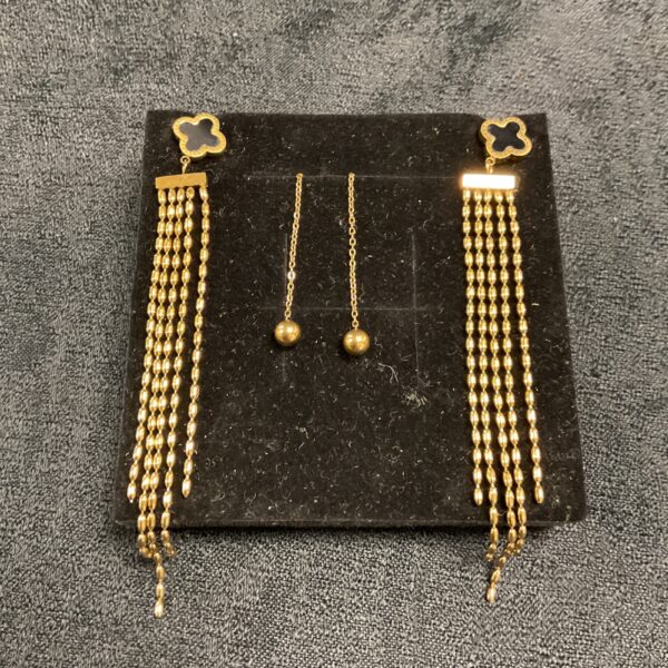 Elegant 18ct gold plated drop earrings with delicate chain detail.
