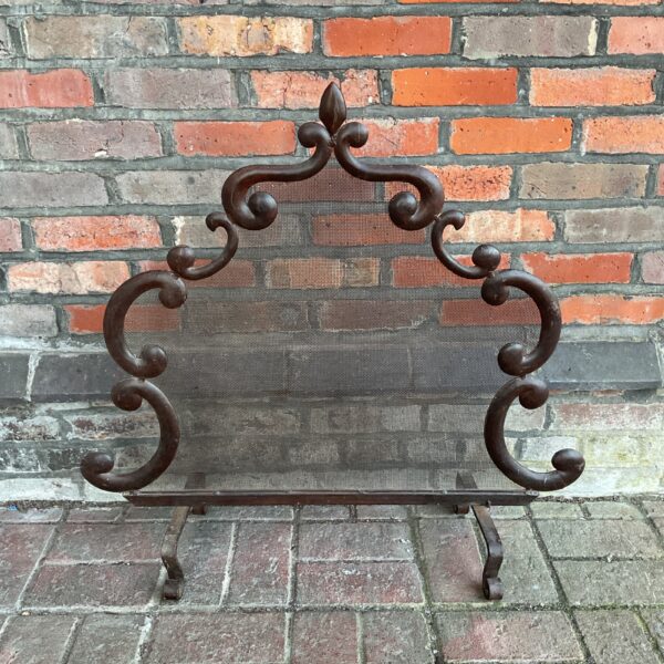 Antique Gothic firescreen with Spanish Renaissance detailing.