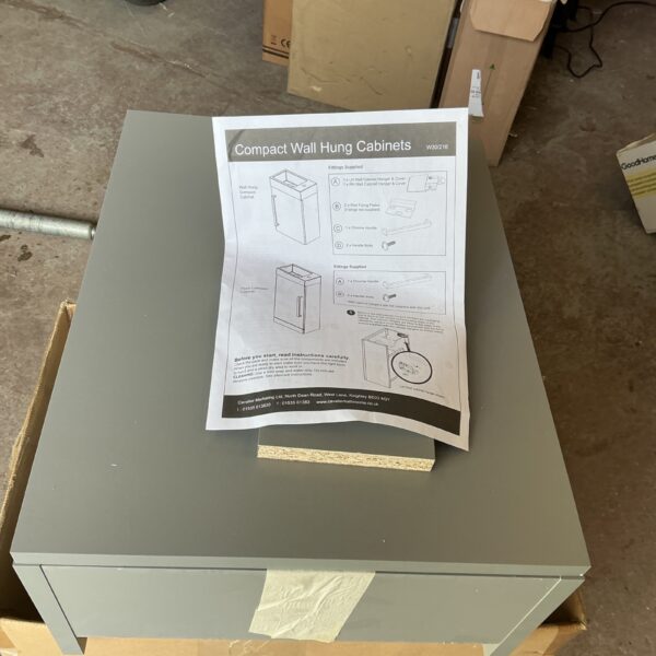 Grey compact wall hung sink cabinet, model W3016, for bathroom storage.