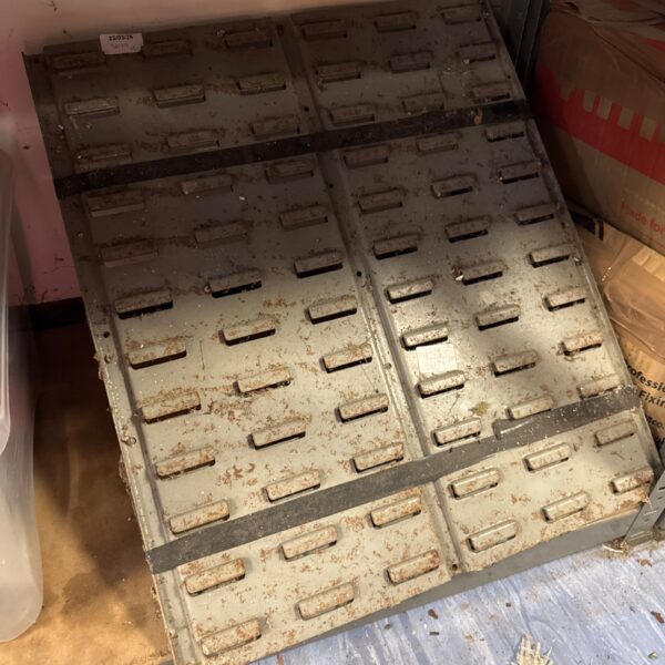 Plastic hanging storage brackets for wall mounting.