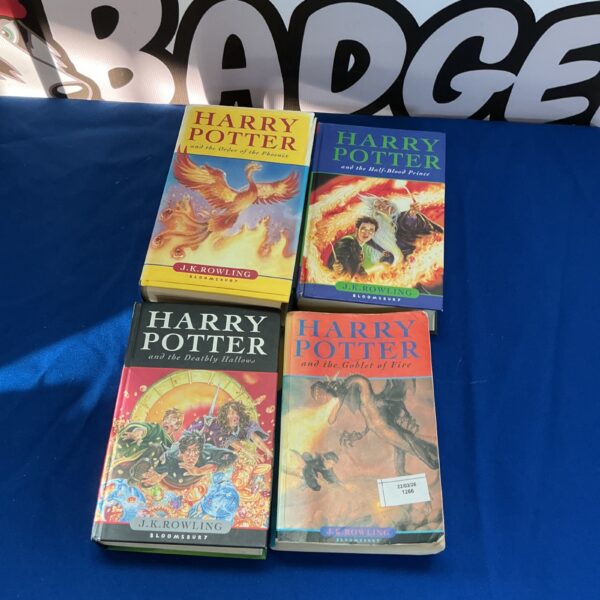 Lot of four Harry Potter books by J.K. Rowling.