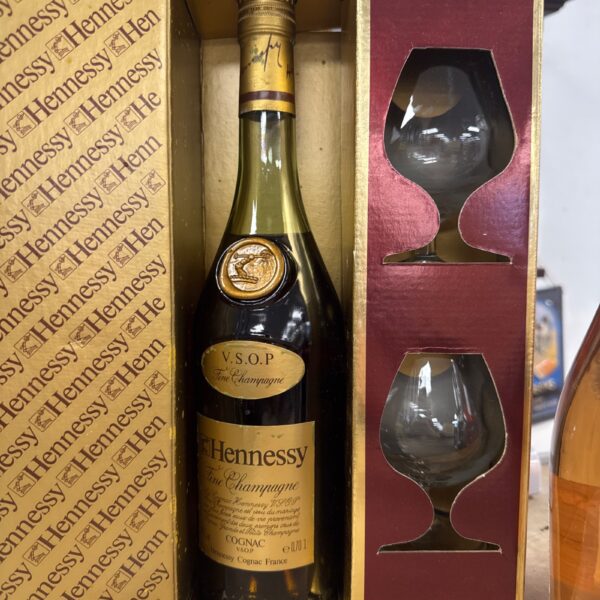 Hennessy Fine Champagne Cognac gift set with bottle and glasses.