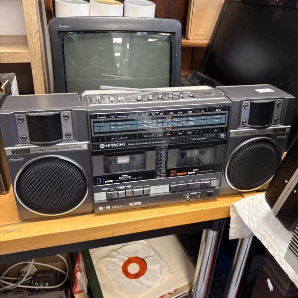 Vintage Hitachi stereo radio cassette recorder, classic portable radio.