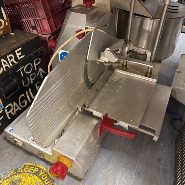 Large Hobart commercial meat slicer for deli and kitchen use.