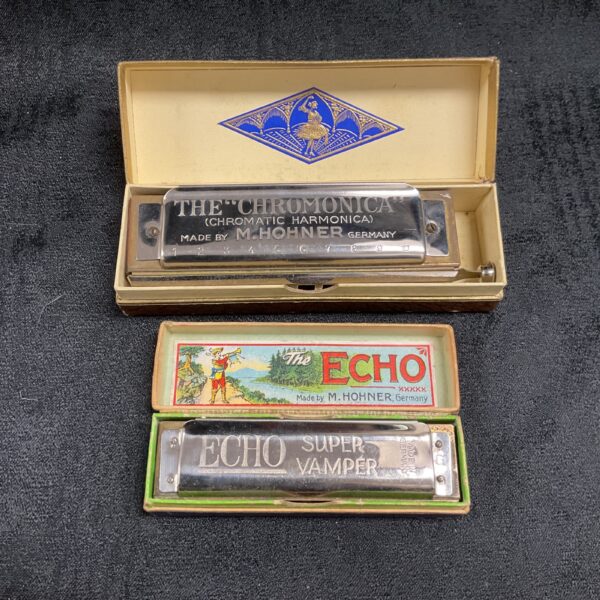 Vintage Hohner Chromonica harmonica in its original box.