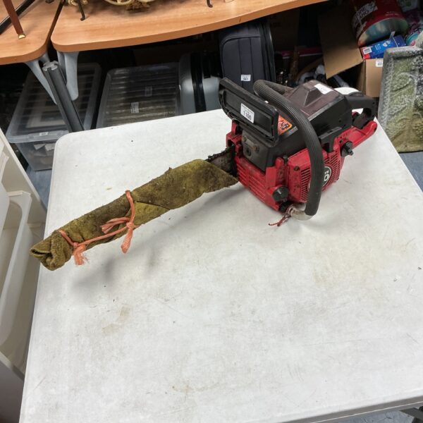Vintage Homelite 290 chainsaw in used condition.