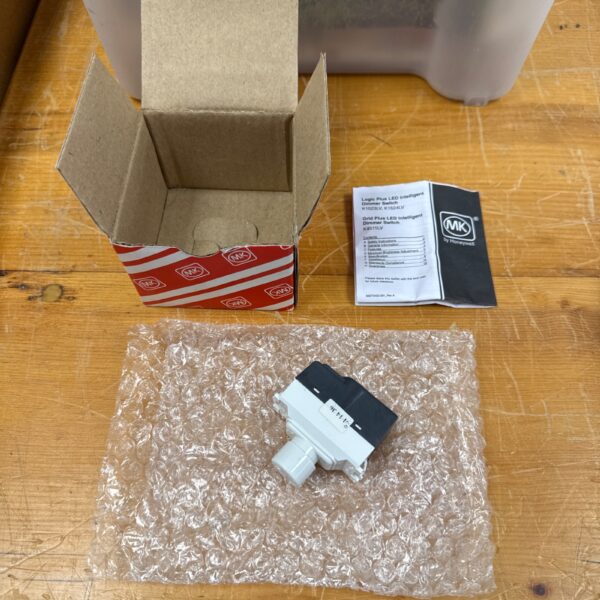White Honeywell MK Logic Plus dimmer switch for home lighting.