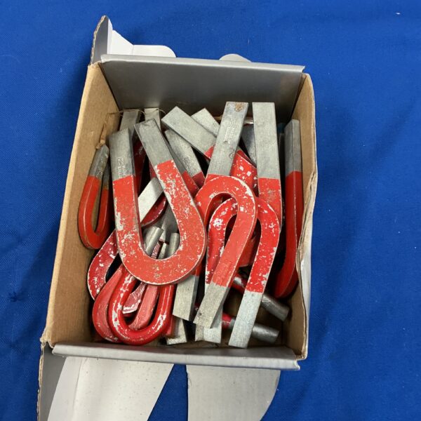 Vintage collection of horseshoe magnets for collectors.