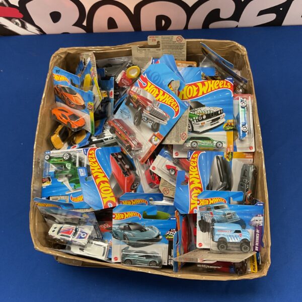 A box filled with a large quantity of Hot Wheels diecast cars.