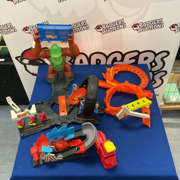 Hot Wheels Gorilla Track dinosaur playset for collectible toy racing.