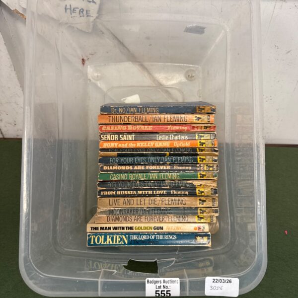 Vintage paperback books by Ian Fleming and J.R.R. Tolkien.