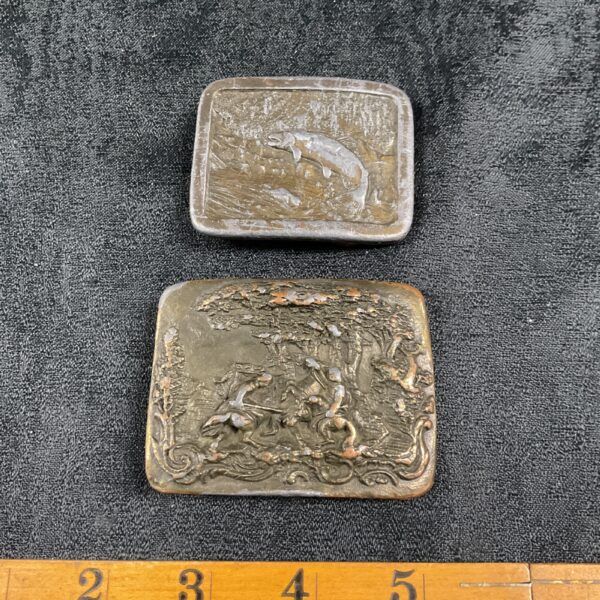 Two cast metal bronzed belt buckles