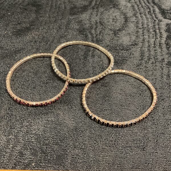 Three 935 silver bracelets set with redvwhite and black stones