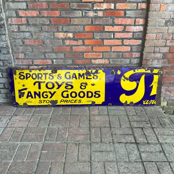 Large vintage sports and games toys and fancy goods in enamel sign
