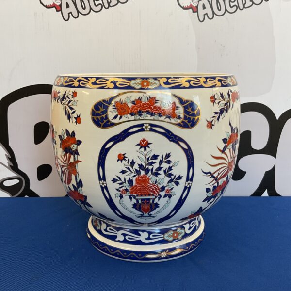 Vintage Imari cache pot with a charming panda pattern in red, blue, and gold.