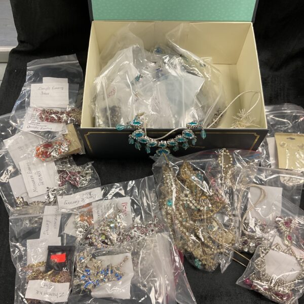 Large lot of colourful Indian jewellery pieces on display.