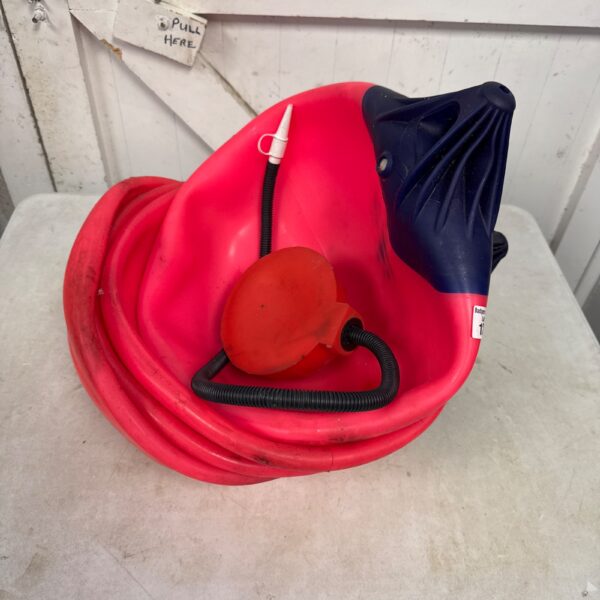 Orange inflatable buoys with a manual pump for water safety.