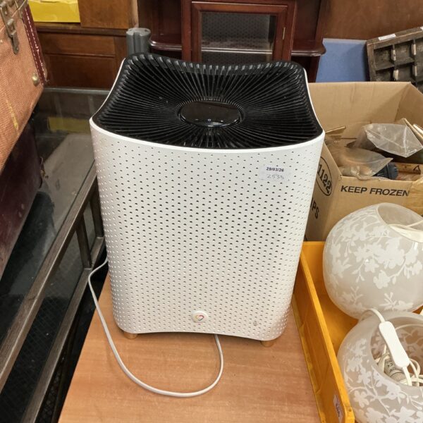 Front view of a vintage Intertribal air purifier.