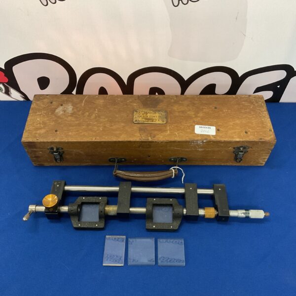 Antique J M G & Sons military stereoscope for viewing stereoscopic images.