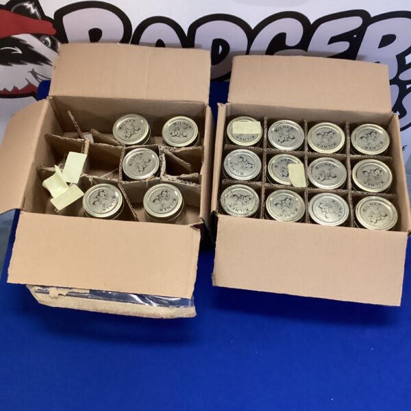 Bundle of vintage Kilner jars for preserving and storage.