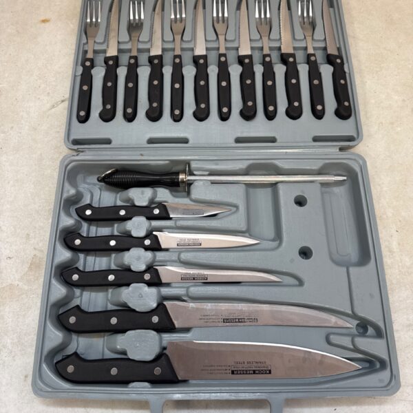 Open Koch Messer knife set with cutlery and sharpener inside case.