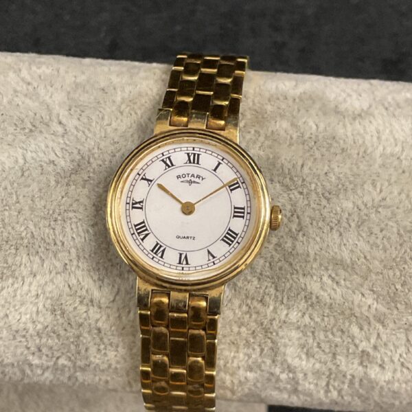 Gold-tone ladies Rotary quartz wristwatch with champagne dial.