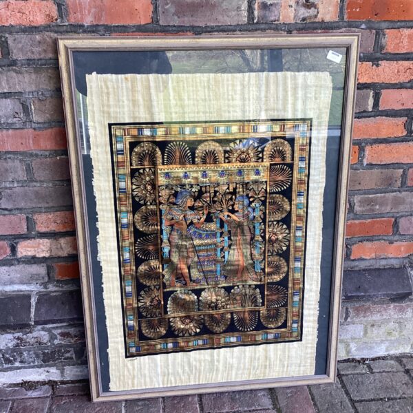 Large signed Egyptian papyrus artwork with detailed figures and vibrant colours.