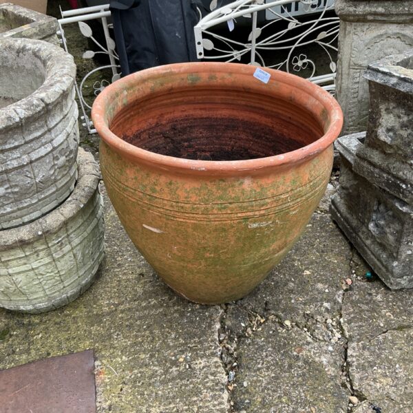 Large terracotta garden pot, ideal for outdoor plants and garden decor.