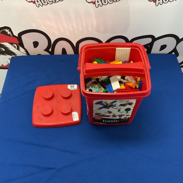 Colourful Lego Basic tub filled with building bricks.